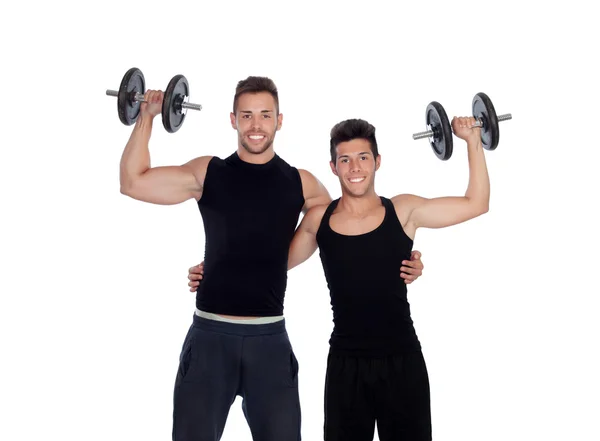 Dos amigos entrenando con pesas — Foto de Stock