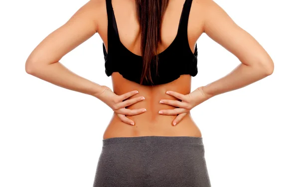 Woman in sport clothes with back pain — Stock Photo, Image