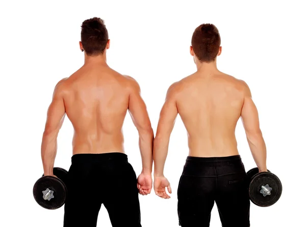 Ein paar gut aussehende muskulöse Männer beim Rückentraining — Stockfoto