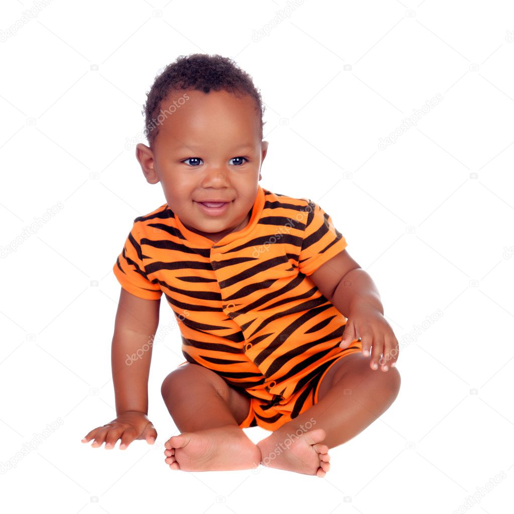 Adorable african baby with with brindle pajamas sitting