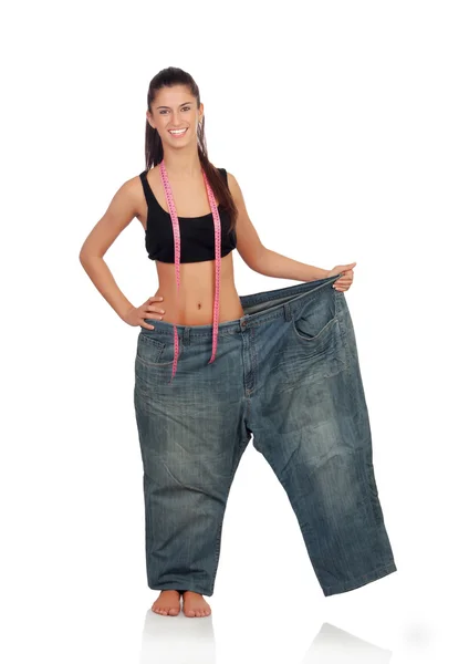 Slim pretty girl with a big trousers — Stock Photo, Image