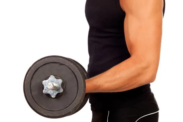 Handsome muscled with dumbbell — Stock Photo, Image