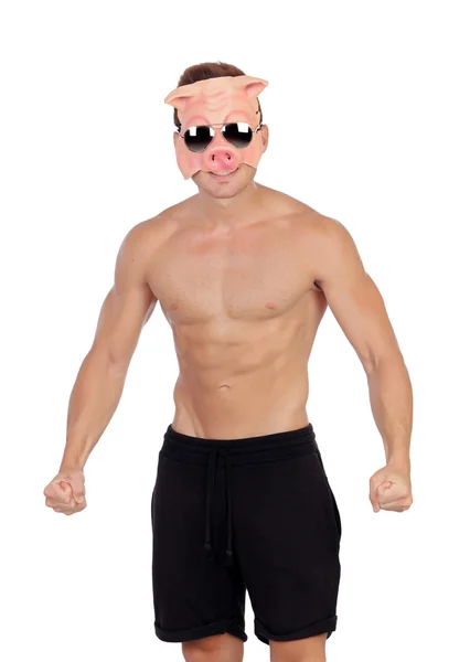 Muscular man with a pig mask — Stock Photo, Image