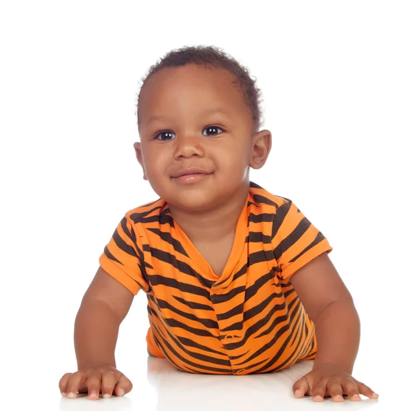 Adorable african baby lying on the floor — Stock Photo, Image