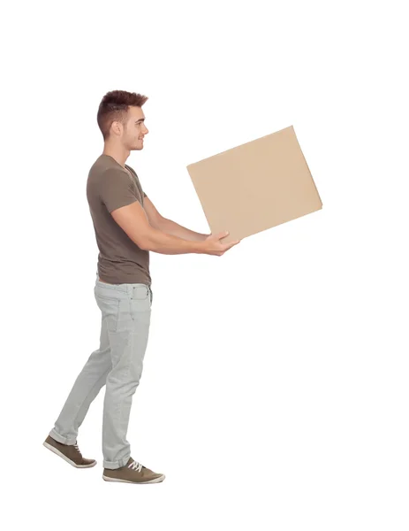 Hombre joven casual sosteniendo una caja — Foto de Stock