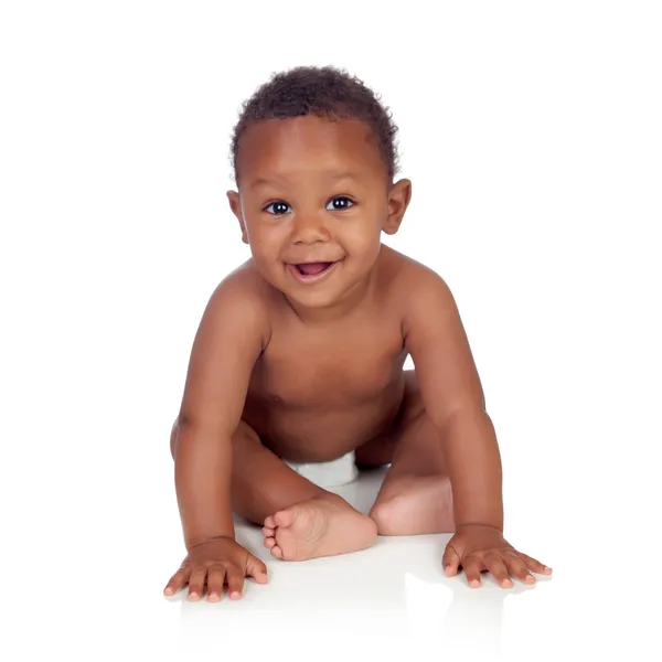 Adorable african baby in diaper sitting on the floor Stock Picture