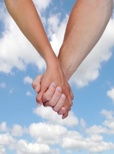 Две руки, скрепленные любовью — стоковое фото