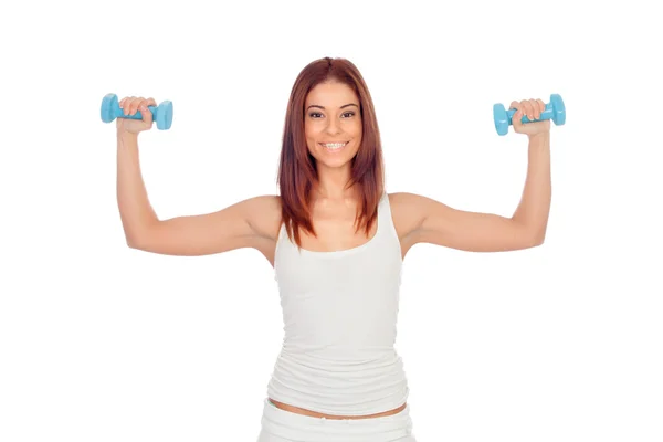 Happy girl in white toning her muscles — Stock Photo, Image