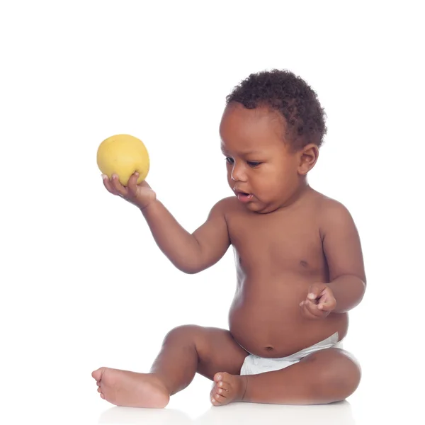 Beautiful african baby diapers eating apple — Stock Photo, Image