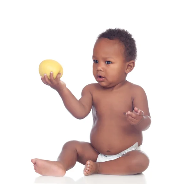 Beautiful african baby diapers eating apple — Stock Photo, Image