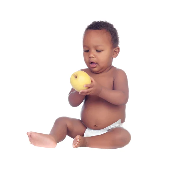 Beautiful african baby diapers eating apple — Stock Photo, Image