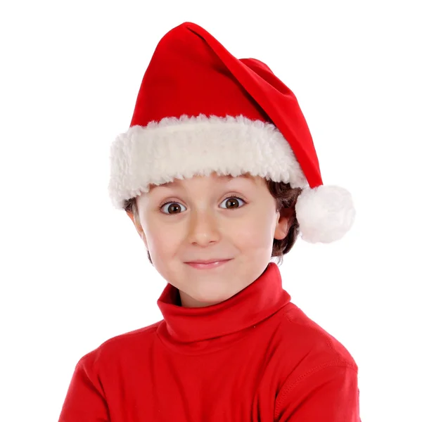 빨간색에서 크리스마스 모자와 함께 재미 있는 어린이 — 스톡 사진