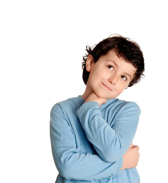 Nadenkend gelukkige jongen in blauw — Stockfoto