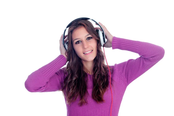 Entertaining girl with headphones listening to music — Stock Photo, Image