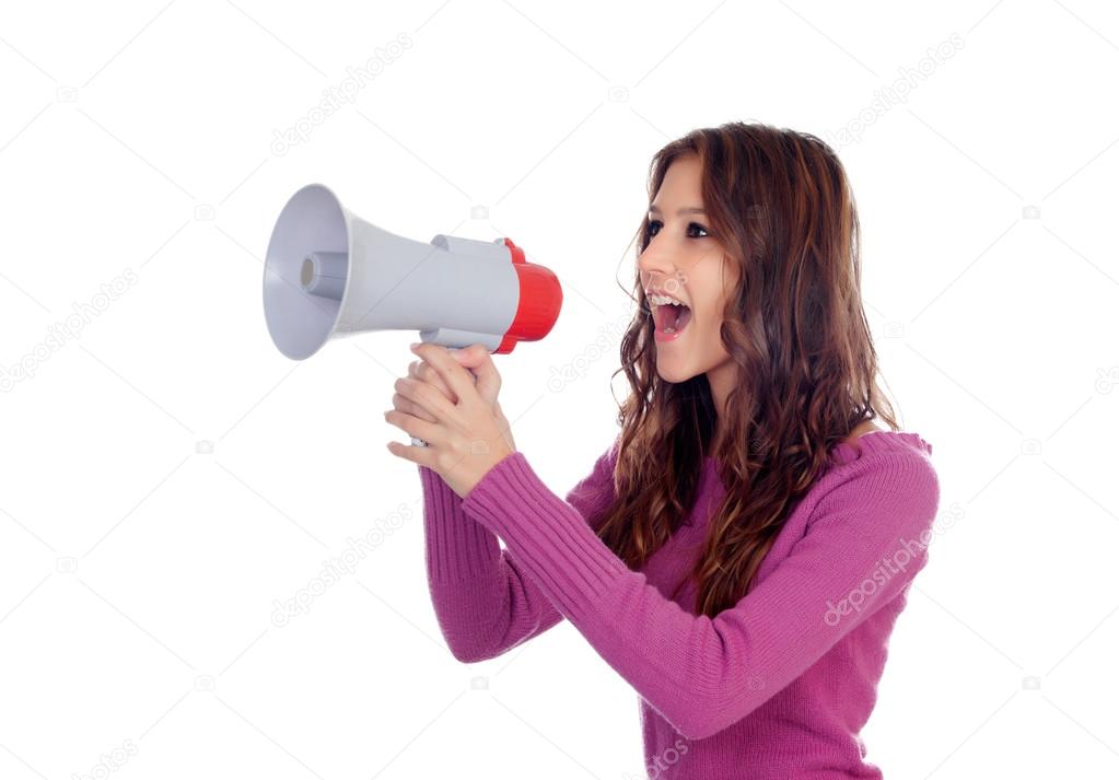 Attractive brunette girl shouting into a megaphone