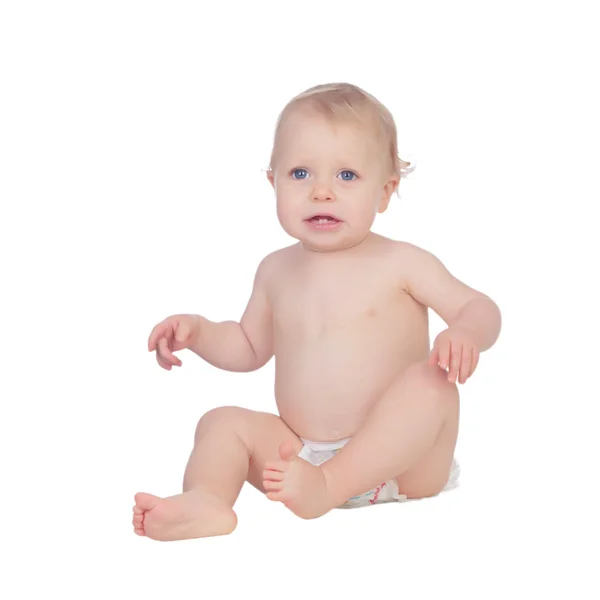 Adorable blond baby in diaper crying sitting on the floor — Stock Photo, Image