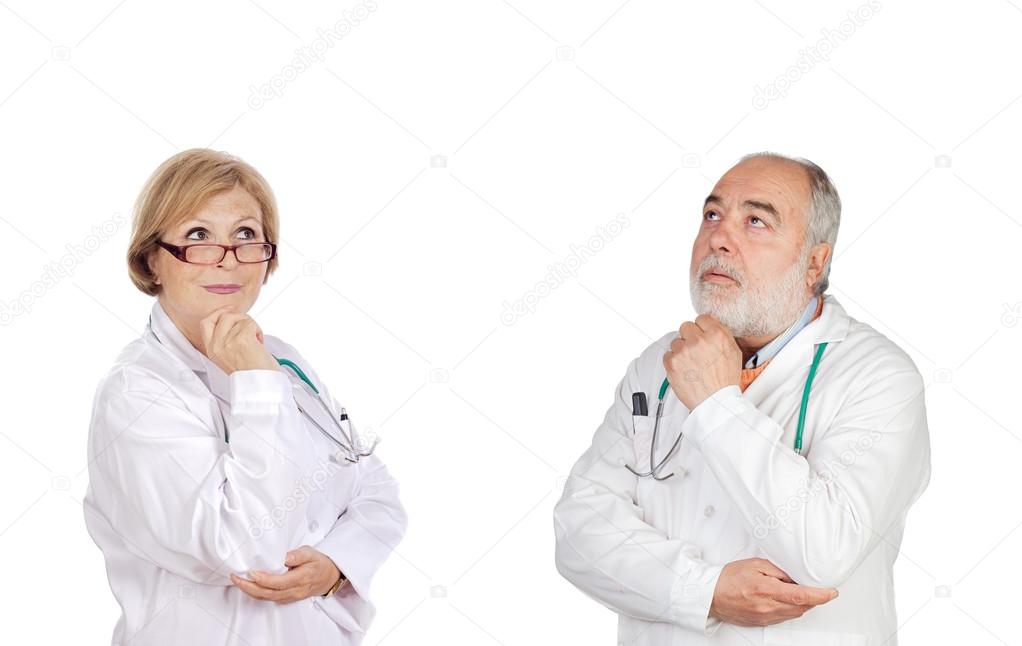 Experienced team of doctors thinking
