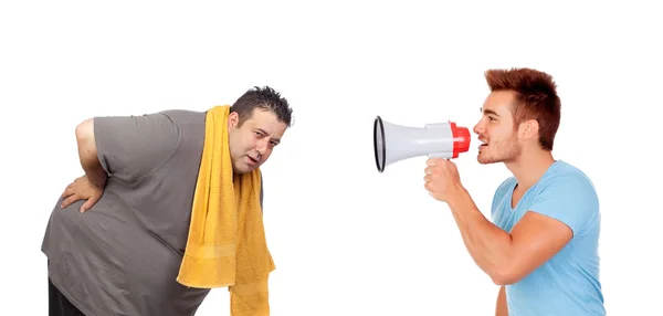 Fat men and his personal trainer with a megaphone — Stock Photo, Image