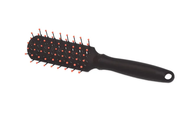 Black hair brush with red tips — Stock Photo, Image