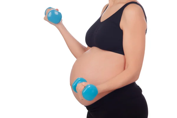 Pregnant woman doing exercise with dumbbells — Stock Photo, Image