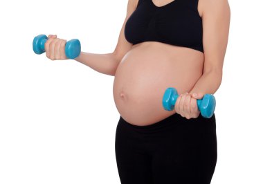 hamile kadın dumbbells ile egzersiz yaparak