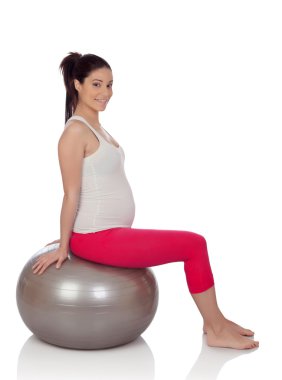 Pilates yapıyor güzel bir hamile kadın