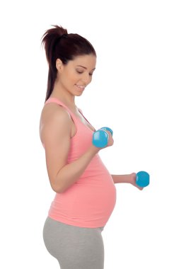 hamile kadın dumbbells ile egzersiz yaparak