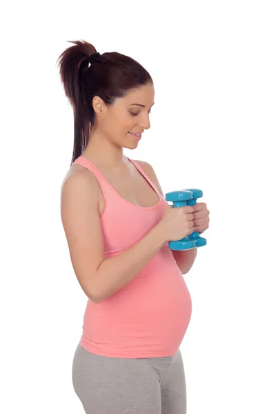 Kobieta w ciąży robi ćwiczenia z hantlami — Zdjęcie stockowe