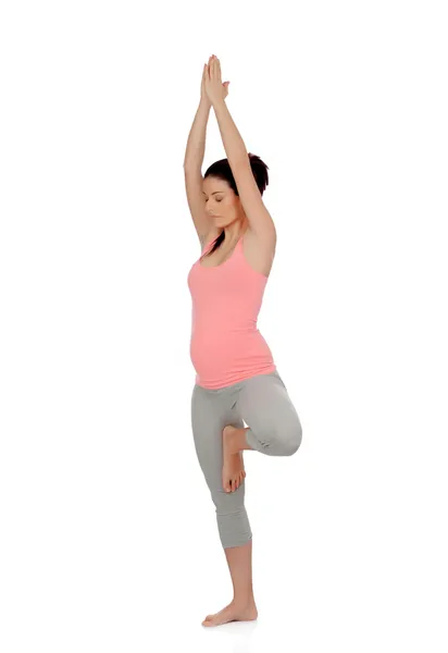 Beautiful pregnant woman doing yoga — Stock Photo, Image