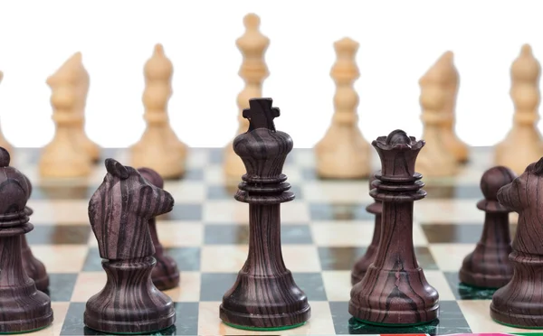 Chess pieces on chessboard — Stock Photo, Image