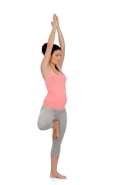 Yoga yaparken güzel bir hamile kadın — Stok fotoğraf
