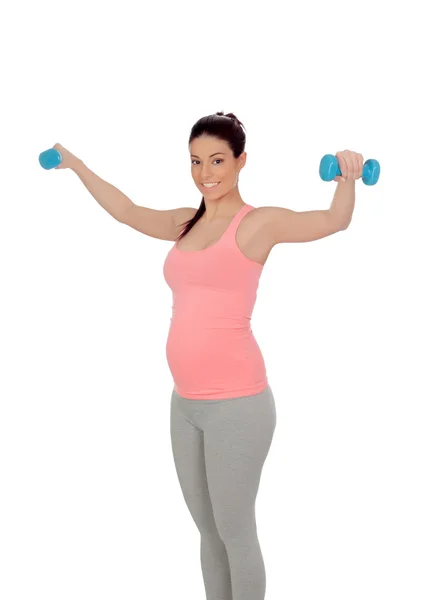 Pregnant woman doing exercise with dumbbells — Stock Photo, Image