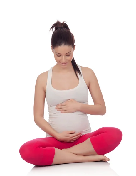 Belle femme enceinte faisant du yoga — Photo