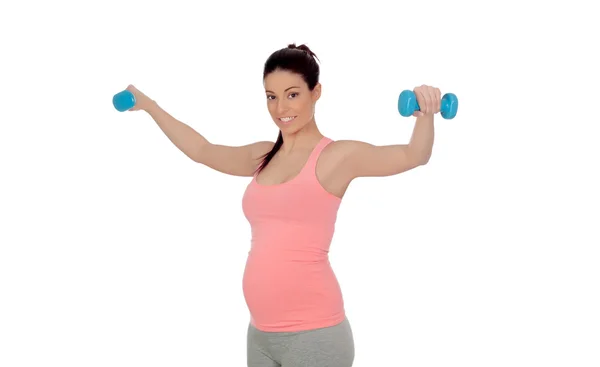 Pregnant woman doing exercise with dumbbells — Stock Photo, Image