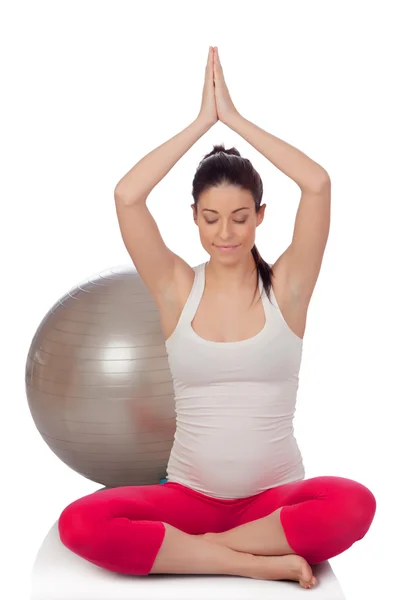 Schöne schwangere Frau macht Pilates — Stockfoto