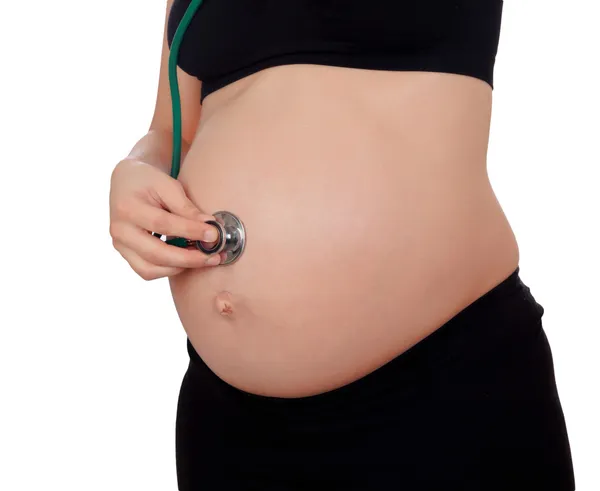 Femme enceinte avec stéthoscope — Photo