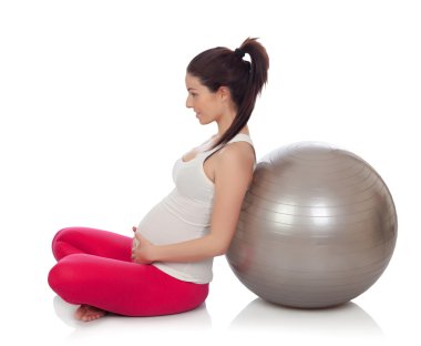 Pilates yapıyor güzel bir hamile kadın