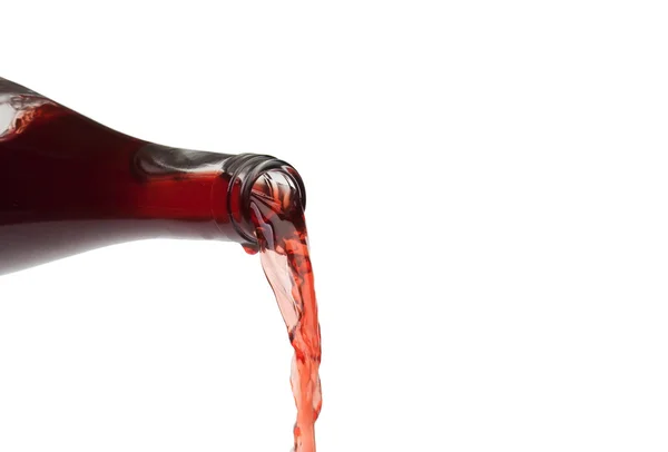 Bottle filling a glass of wine — Stock Photo, Image