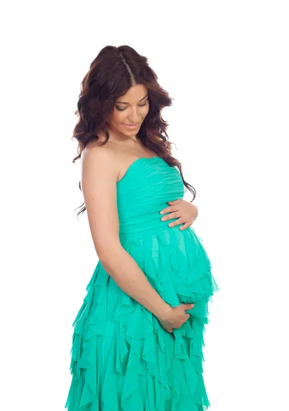 Beatiful pregnant woman with green dress — Stock Photo, Image