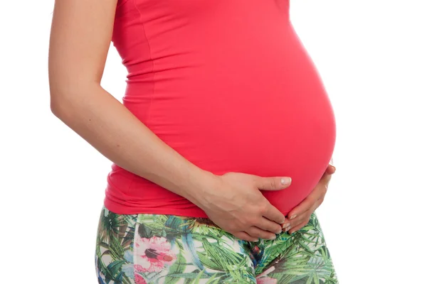 Wanita hamil beatiful terisolasi pada latar belakang putih — Stok Foto