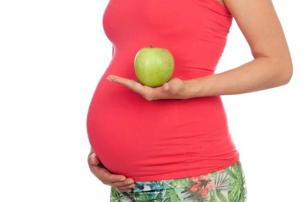 Beatiful pregnant woman with a apple — Stock Photo, Image