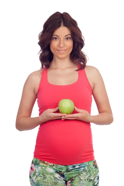 Schöne schwangere Frau mit einem Apfel — Stockfoto