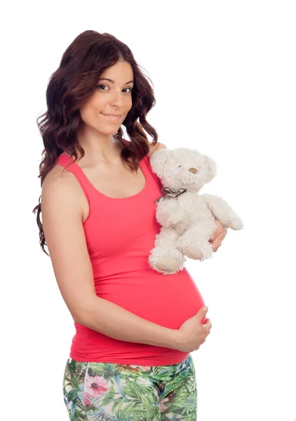 Mulher grávida com um ursinho — Fotografia de Stock