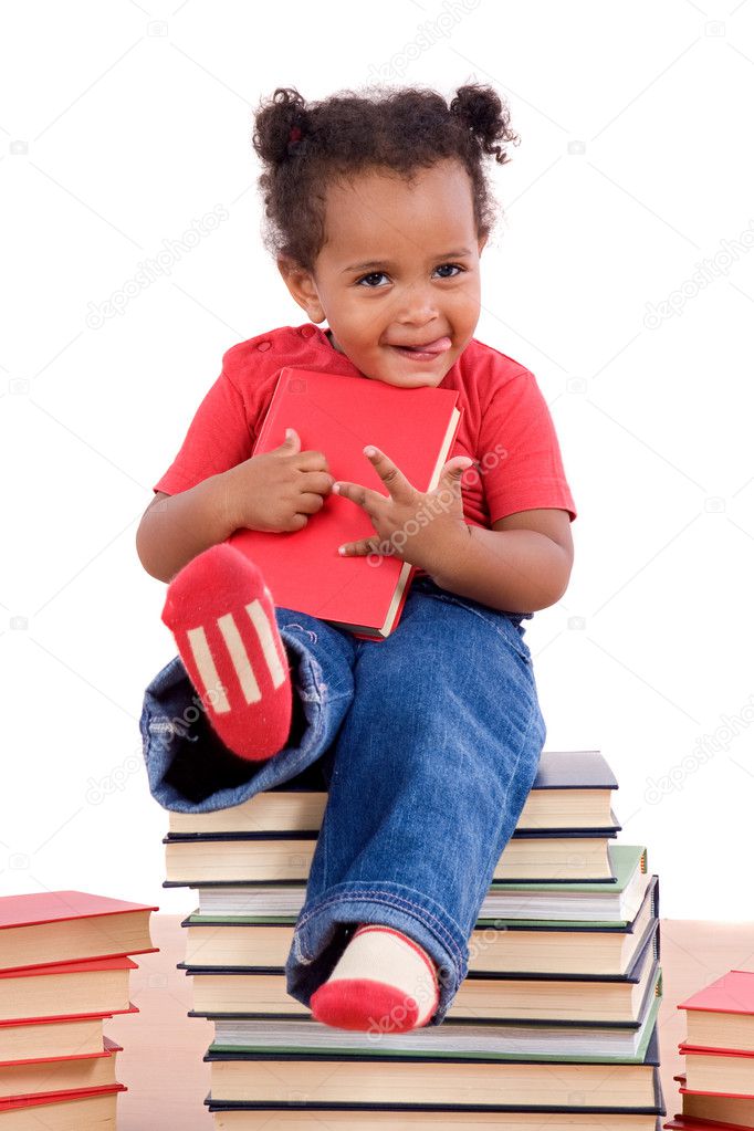 African little girl sitting on many books