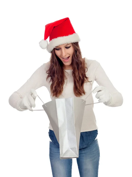 Atractiva chica casual con compras sombrero de Navidad —  Fotos de Stock