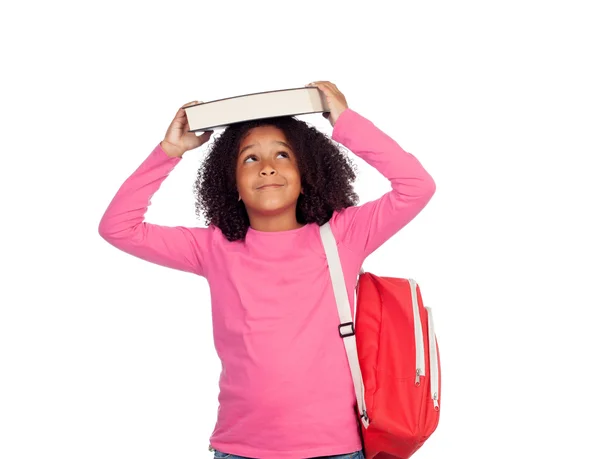 Student meisje met een boek over haar hoofd — Stockfoto