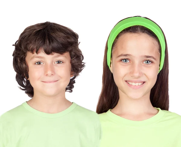 Menino e menina em verde — Fotografia de Stock