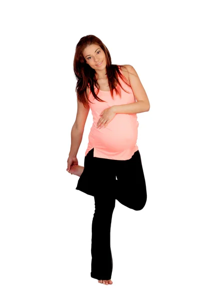 Beautiful pregnant woman doing stretching — Stock Photo, Image