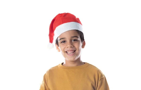 白色背景下戴红色桑塔帽的小孩画像 图库图片