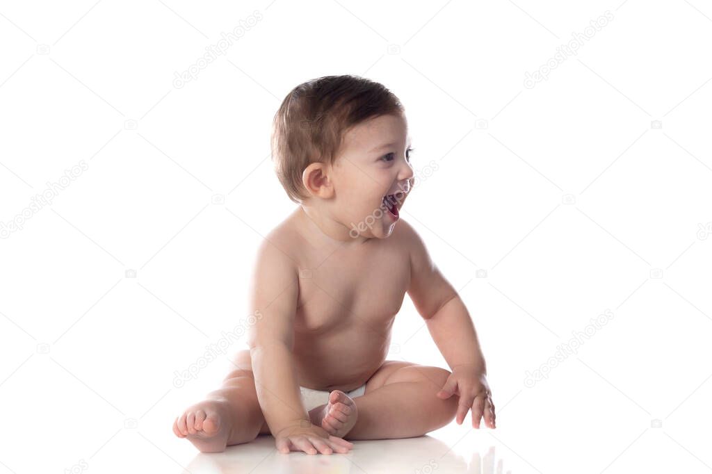Cute baby in diaper looking at the camera isolated on a white background 
